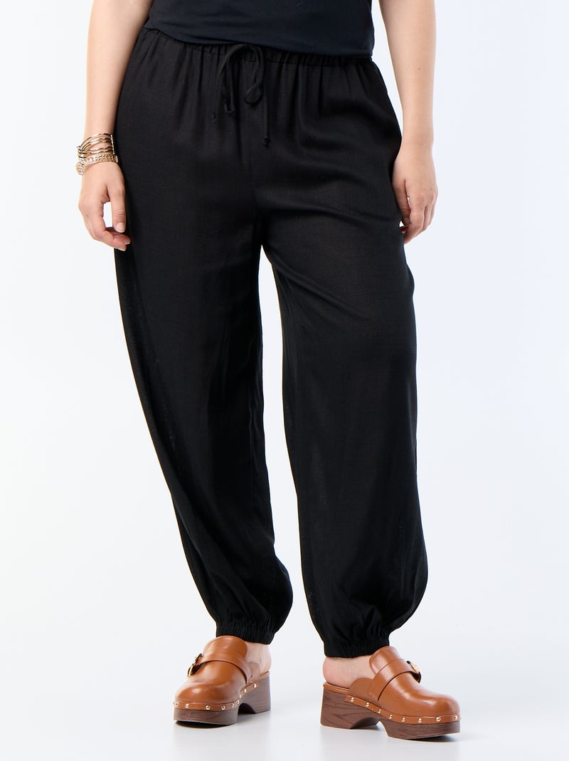 Pantalón liso de corte globo Negro - Kiabi