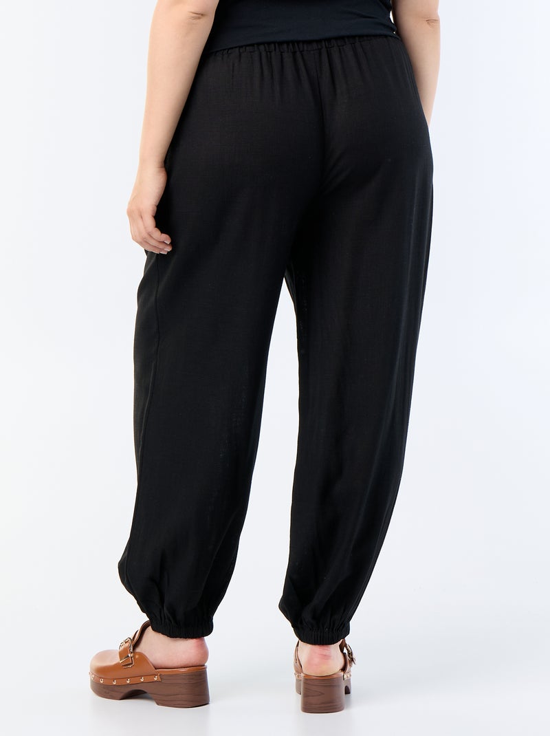 Pantalón liso de corte globo Negro - Kiabi
