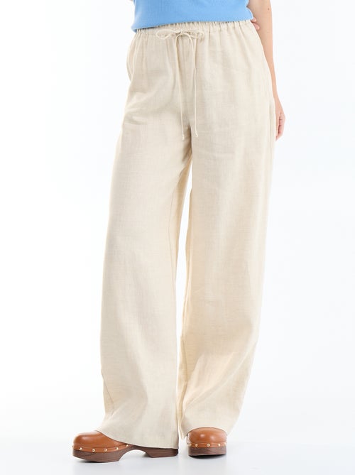 Pantalón liso de lino de corte ancho - Kiabi Pantalón liso de lino de corte ancho - Kiabi