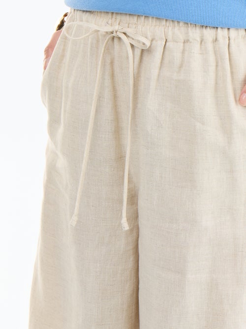 Pantalón liso de lino de corte ancho - Kiabi Pantalón liso de lino de corte ancho - Kiabi