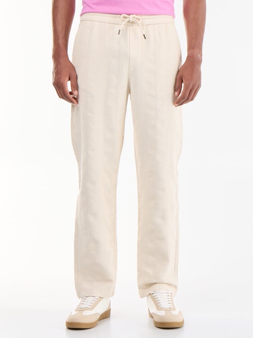 Pantalón liso de tejido texturizado - Kiabi