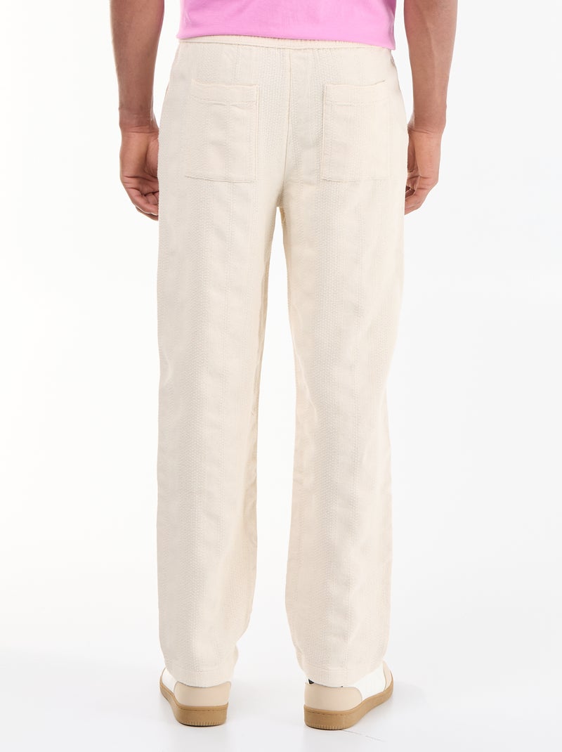 Pantalón liso de tejido texturizado Beige - Kiabi