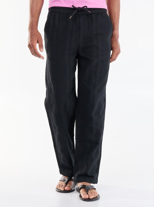 Pantalón liso de tejido texturizado - Kiabi Pantalón liso de tejido texturizado - Kiabi