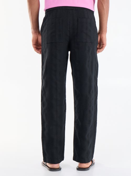Pantalón liso de tejido texturizado - Kiabi Pantalón liso de tejido texturizado - Kiabi