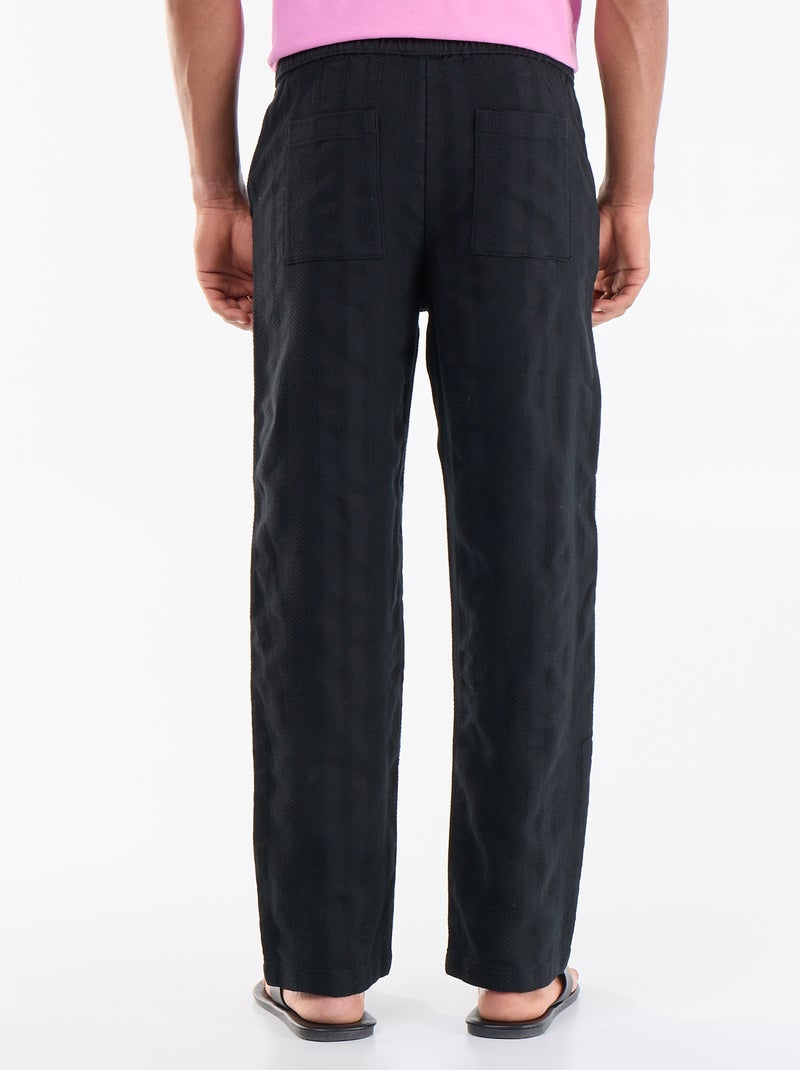 Pantalón liso de tejido texturizado Negro - Kiabi