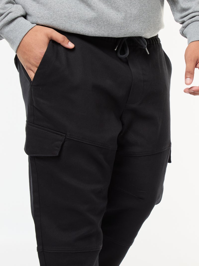 Pantalón multibolsillos liso con cinturón elástico Negro - Kiabi