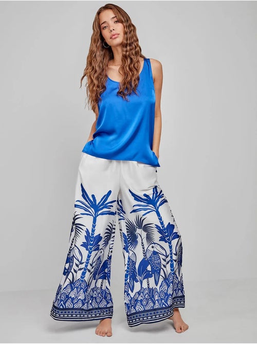 Pantalón palazzo con estampado tropical en tejido de satén - Kiabi Pantalón palazzo con estampado tropical en tejido de satén - Kiabi