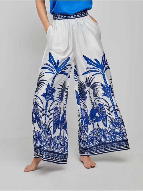 Pantalón palazzo con estampado tropical en tejido de satén - Kiabi Pantalón palazzo con estampado tropical en tejido de satén - Kiabi