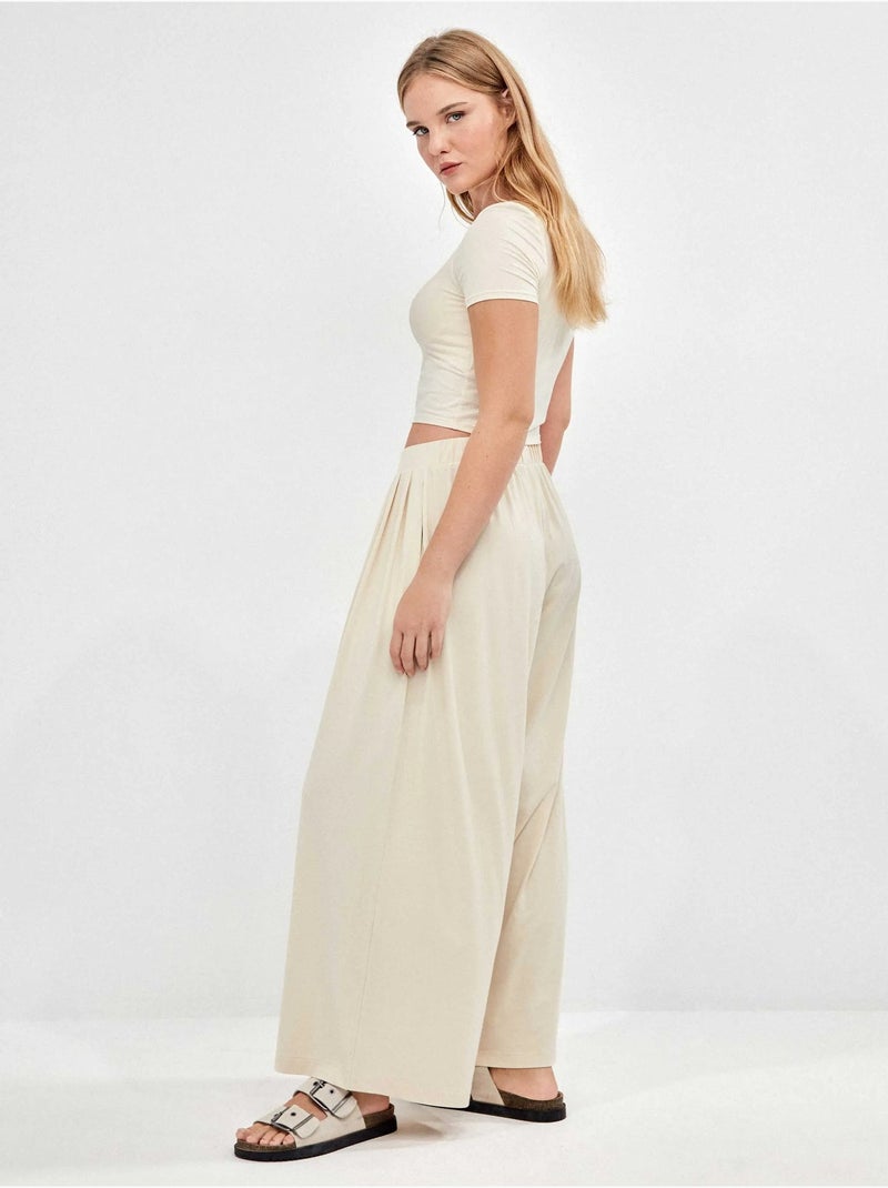 Pantalón palazzo fruncido en tejido modal ligero Beige - Kiabi