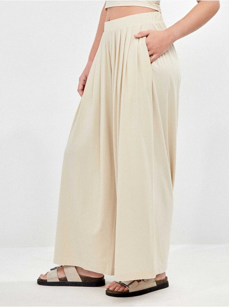 Pantalón palazzo fruncido en tejido modal ligero Beige - Kiabi