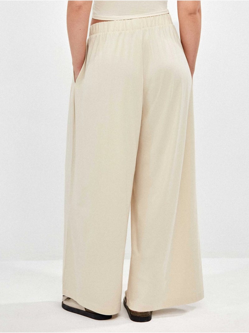 Pantalón palazzo fruncido en tejido modal ligero Beige - Kiabi
