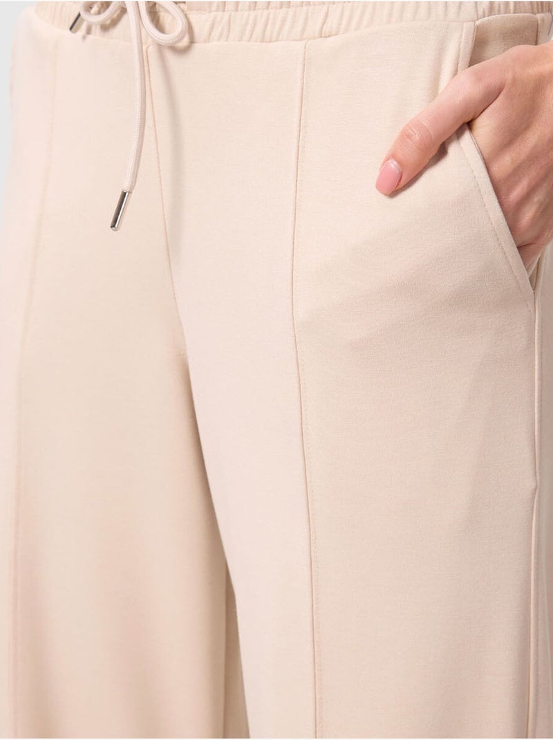 Pantalón palazzo texturizado de pernera ancha con cintura de cordón tommy Beige arcilla - Kiabi
