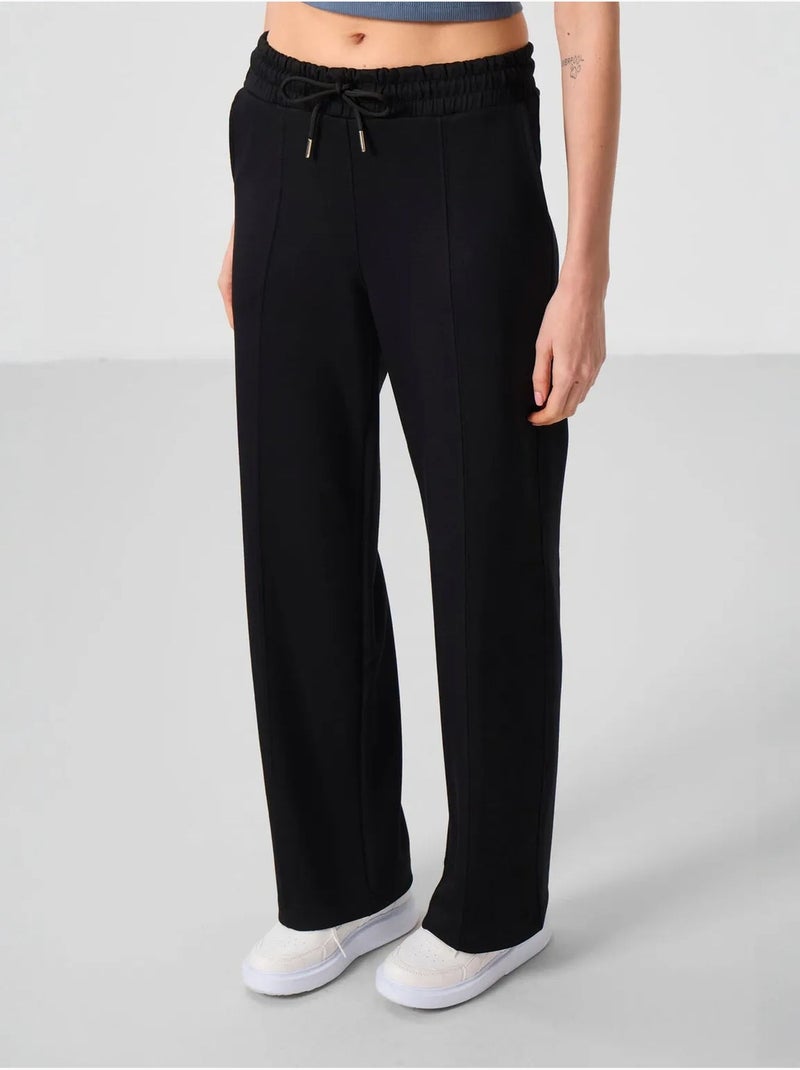Pantalón palazzo texturizado de pernera ancha con cintura de cordón tommy Negro - Kiabi