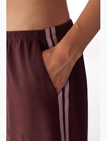 Pantalón parachute de pierna ancha con detalle de lazo penti