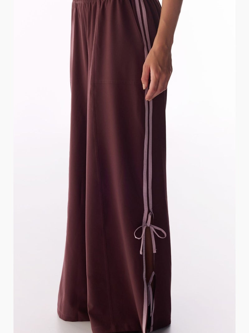Pantalón parachute de pierna ancha con detalle de lazo penti Rojo burdeos - Kiabi