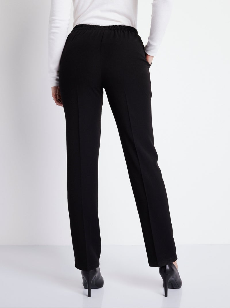 Pantalón recto con cintura semielástica y vientre plano. Negro - Kiabi