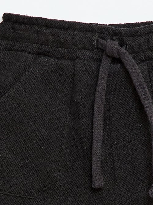 Pantalón relax de punto piqué - Kiabi