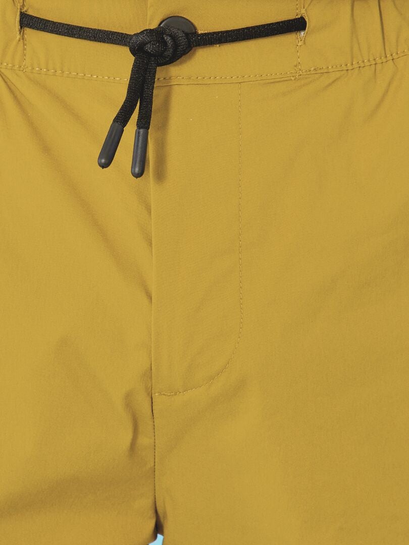 Pantalón slim con bolsillos laterales KAKI - Kiabi