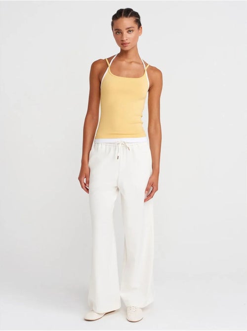 Pantalón tejido de pernera ancha con cintura de cordón dilvin - Kiabi