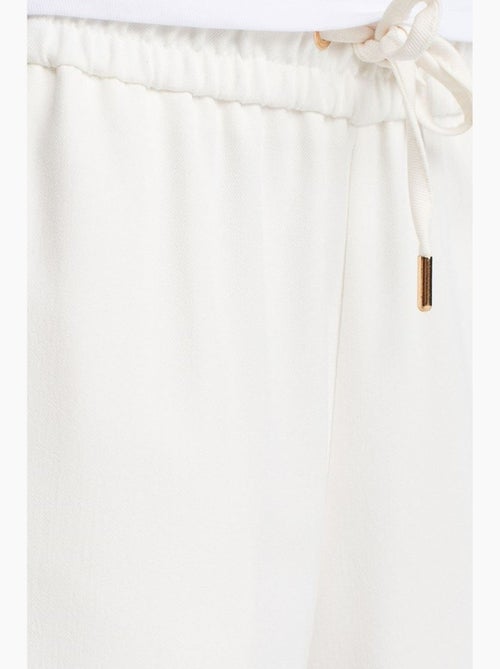 Pantalón tejido de pernera ancha con cintura de cordón dilvin - Kiabi
