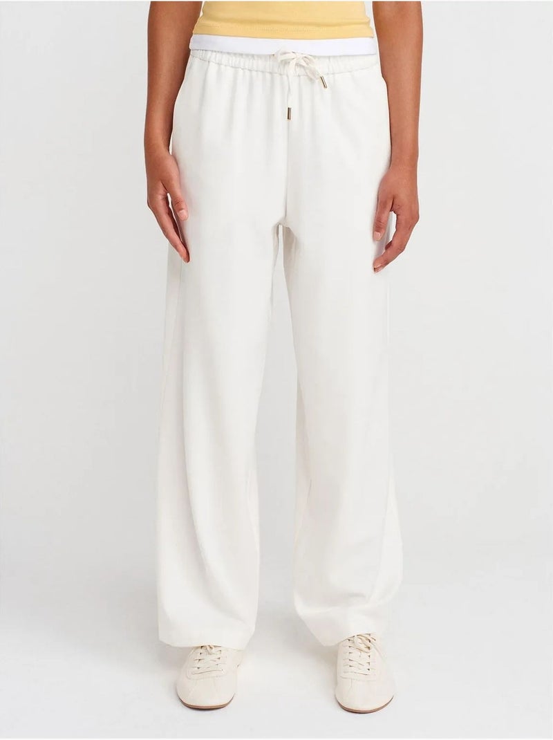 Pantalón tejido de pernera ancha con cintura de cordón dilvin Blanco - Kiabi