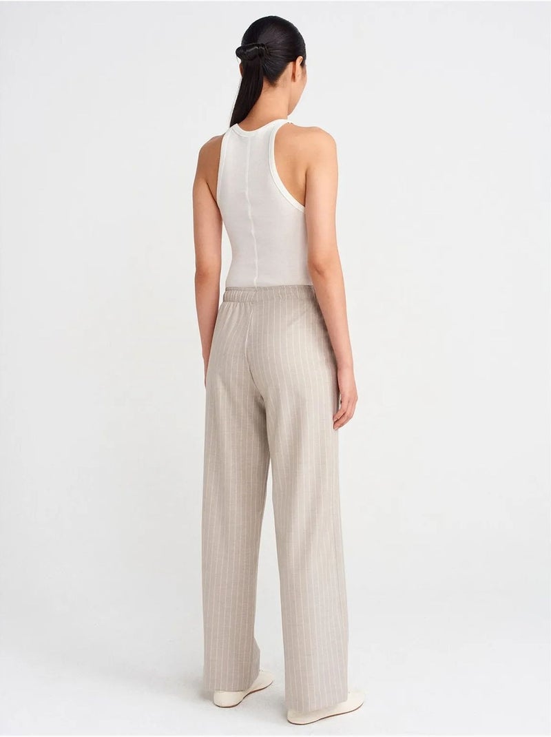 Pantalón tejido de rayas de pernera ancha dilvin Arena - Kiabi
