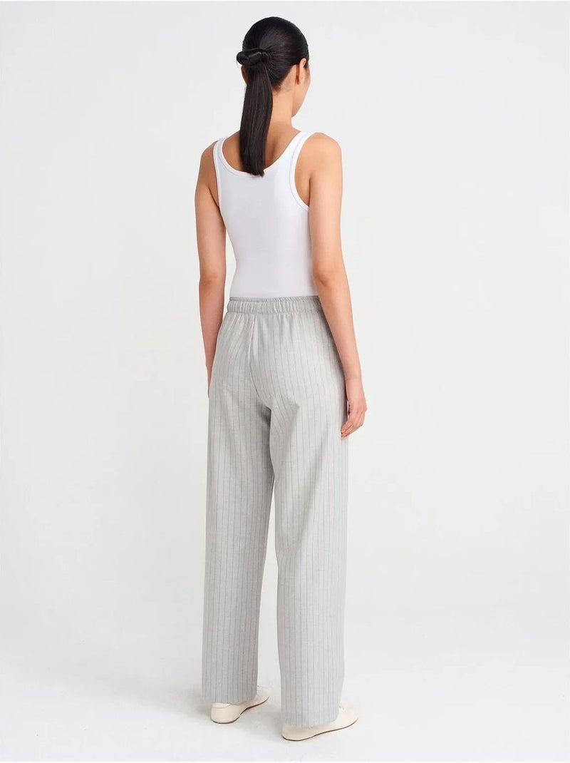 Pantalón tejido de rayas de pernera ancha dilvin Gris claro - Kiabi