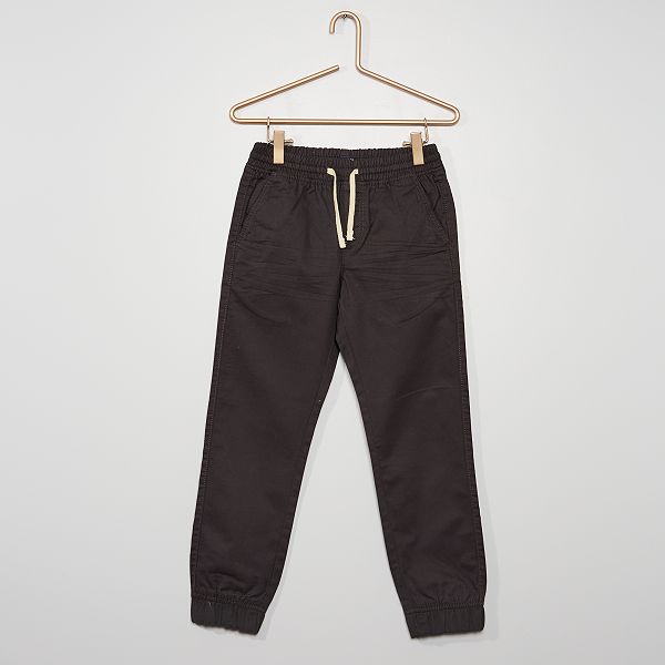 Pantalón tipo 'jogger' Niño 3-12 años - gris oscuro - Kiabi - 8,00€