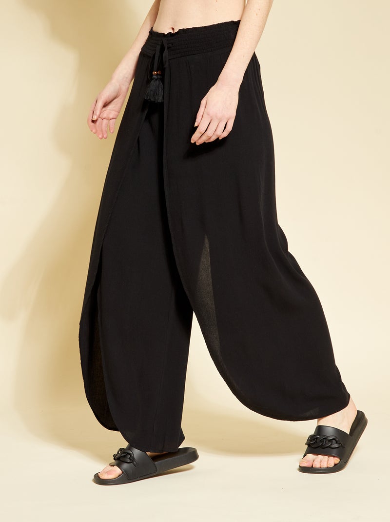 Pantalón vaporoso de punto de crepé con calados Negro - Kiabi