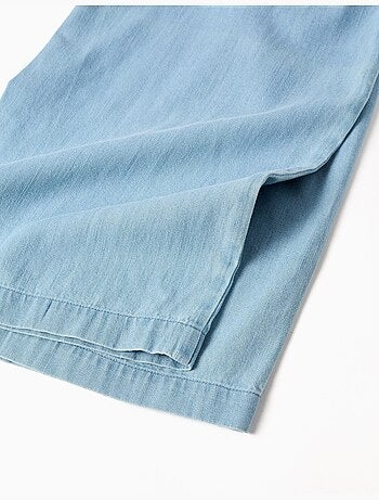 Pantalón vaquero con cinturón floral y cintura paperbag