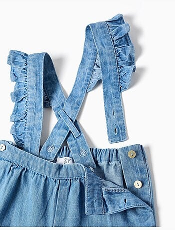 Pantalón vaquero con tirantes desmontables
