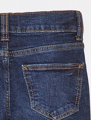 Pantalón vaquero corte flare - Corte + ajustado