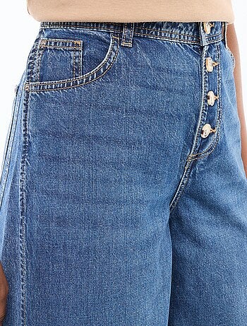 Pantalón vaquero palazzo con detalles