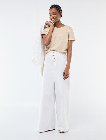 Pantalón vaquero palazzo con detalles