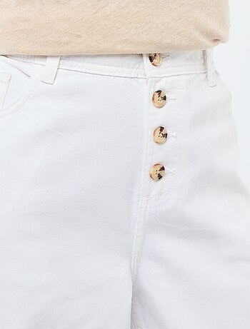 Pantalón vaquero palazzo con detalles