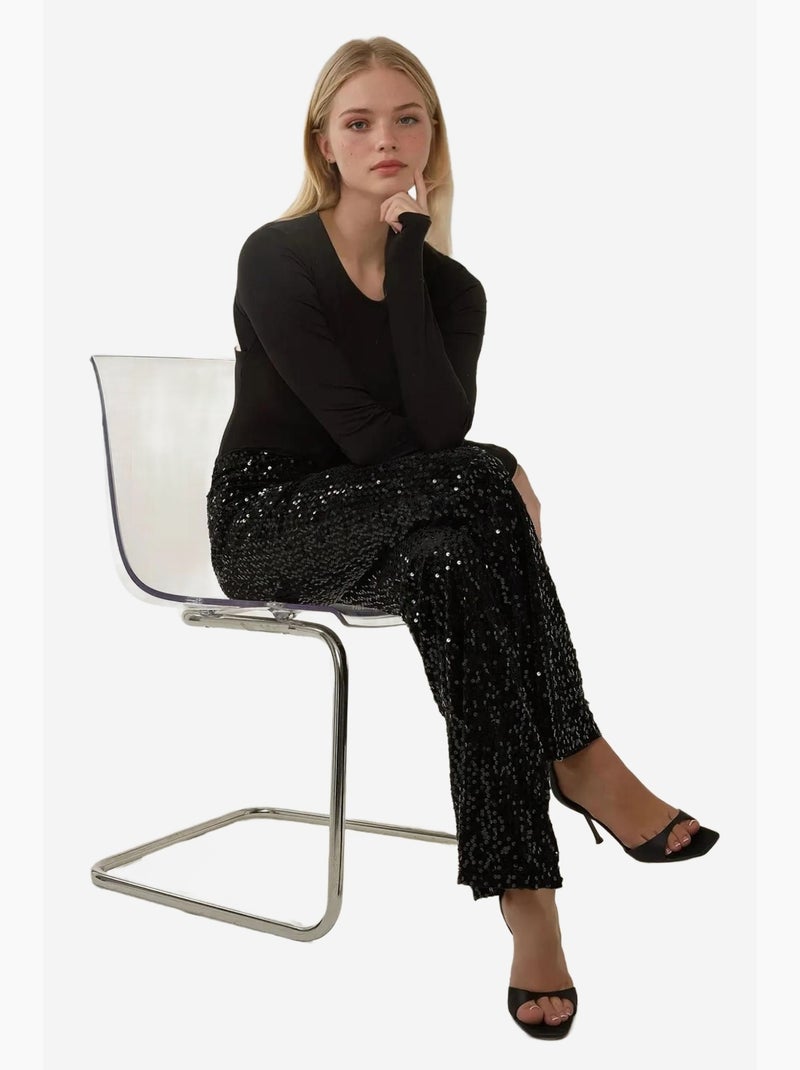 Pantalones acampanados con lentejuelas hiccup Negro - Kiabi
