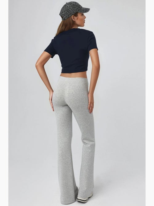 Pantalones acampanados de cintura alta con cinturilla elástica busem - Kiabi Pantalones acampanados de cintura alta con cinturilla elástica busem - Kiabi