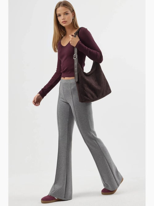 Pantalones acampanados de cintura alta con cinturilla elástica busem - Kiabi Pantalones acampanados de cintura alta con cinturilla elástica busem - Kiabi