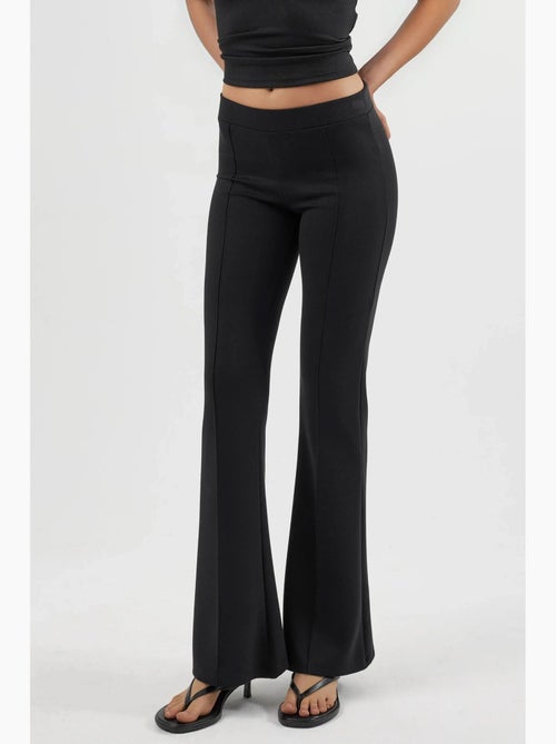 Pantalones acampanados de cintura alta con cinturilla elástica busem - Kiabi Pantalones acampanados de cintura alta con cinturilla elástica busem - Kiabi