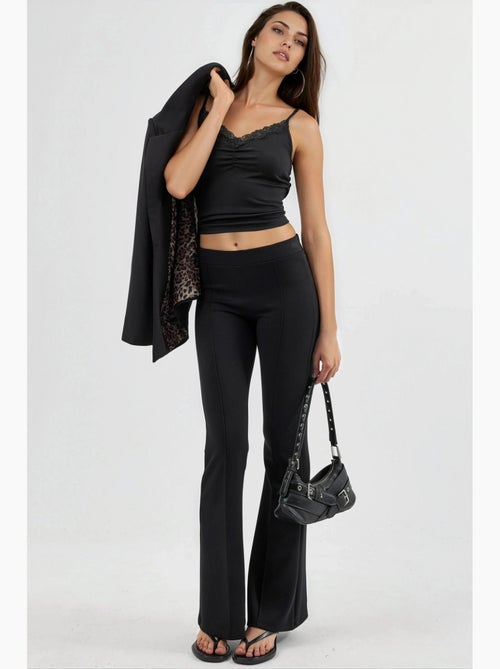 Pantalones acampanados de cintura alta con cinturilla elástica busem - Kiabi Pantalones acampanados de cintura alta con cinturilla elástica busem - Kiabi