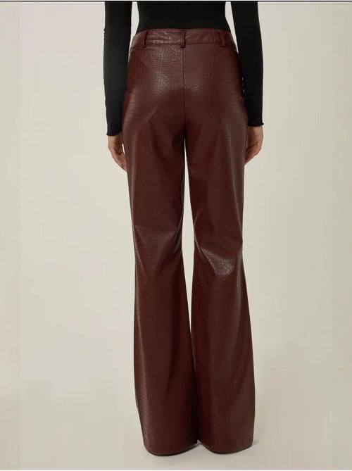 Pantalones acampanados de polipiel de tiro alto hiccup - Kiabi Pantalones acampanados de polipiel de tiro alto hiccup - Kiabi