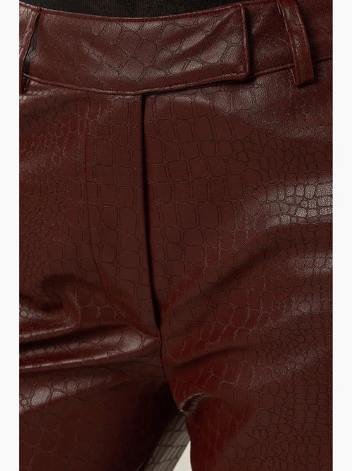 Pantalones acampanados de polipiel de tiro alto hiccup - Kiabi Pantalones acampanados de polipiel de tiro alto hiccup - Kiabi
