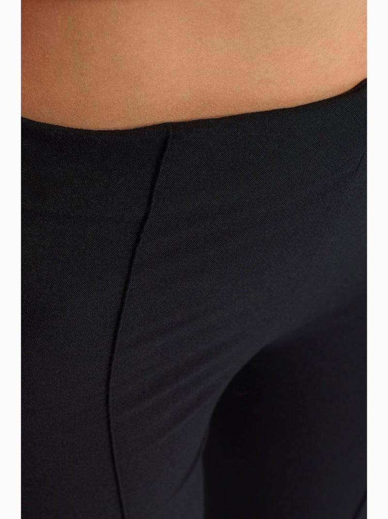 Pantalones acampanados de tiro alto con abertura dilvin Negro - Kiabi