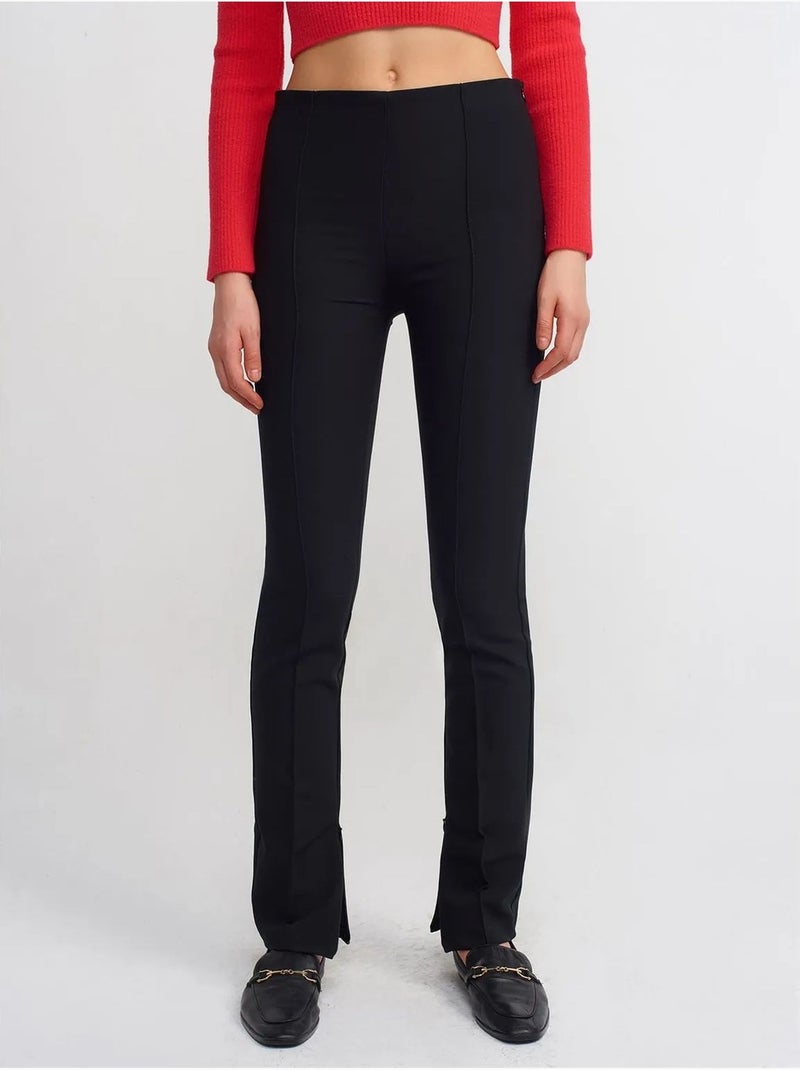Pantalones acampanados de tiro alto con abertura Negro - Kiabi