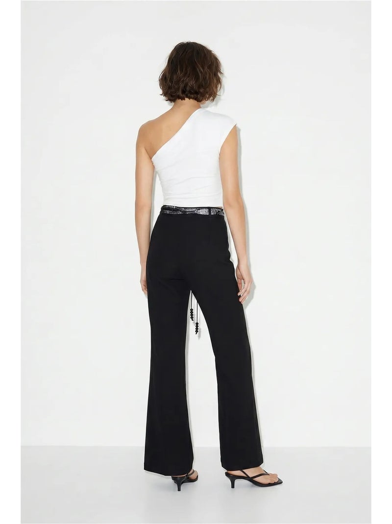 Pantalones acampanados de tiro alto con cinturón lucci Negro - Kiabi