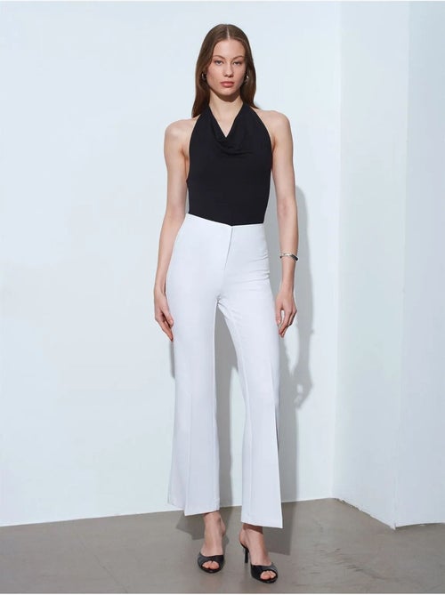 Pantalones acampanados de tiro alto para mujer - Kiabi Pantalones acampanados de tiro alto para mujer - Kiabi