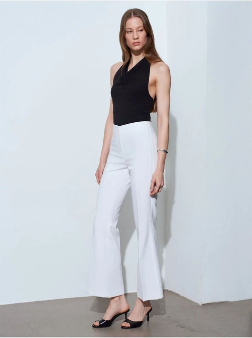 Pantalones acampanados de tiro alto para mujer - Kiabi Pantalones acampanados de tiro alto para mujer - Kiabi