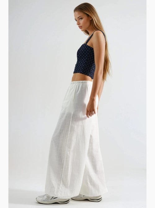 Pantalones anchos con cintura con cordón busem - Kiabi Pantalones anchos con cintura con cordón busem - Kiabi