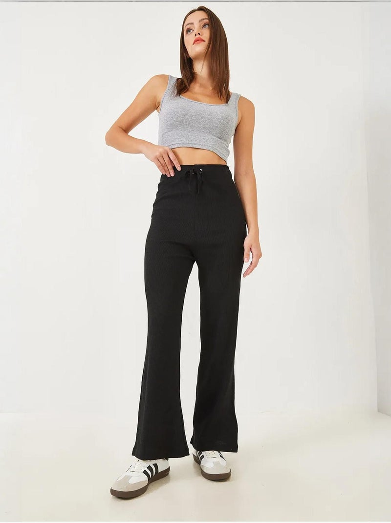 Pantalones anchos de canalé con lazo en la cintura lucci Negro - Kiabi