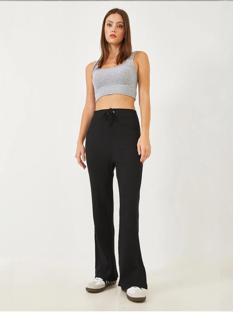 Pantalones anchos de canalé con lazo en la cintura lucci Negro - Kiabi